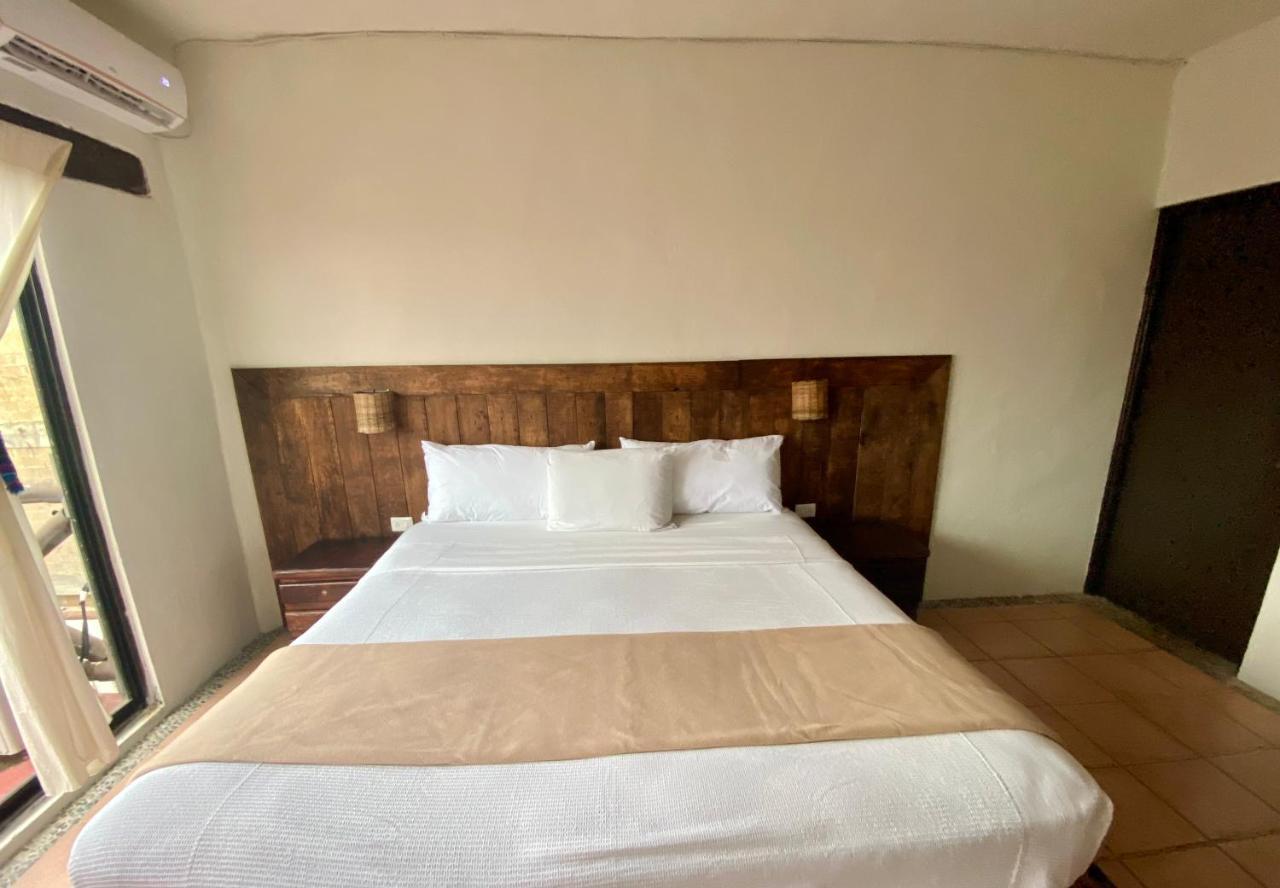 Casa Caribe 칸쿤 외부 사진 A bedroom at the hotel