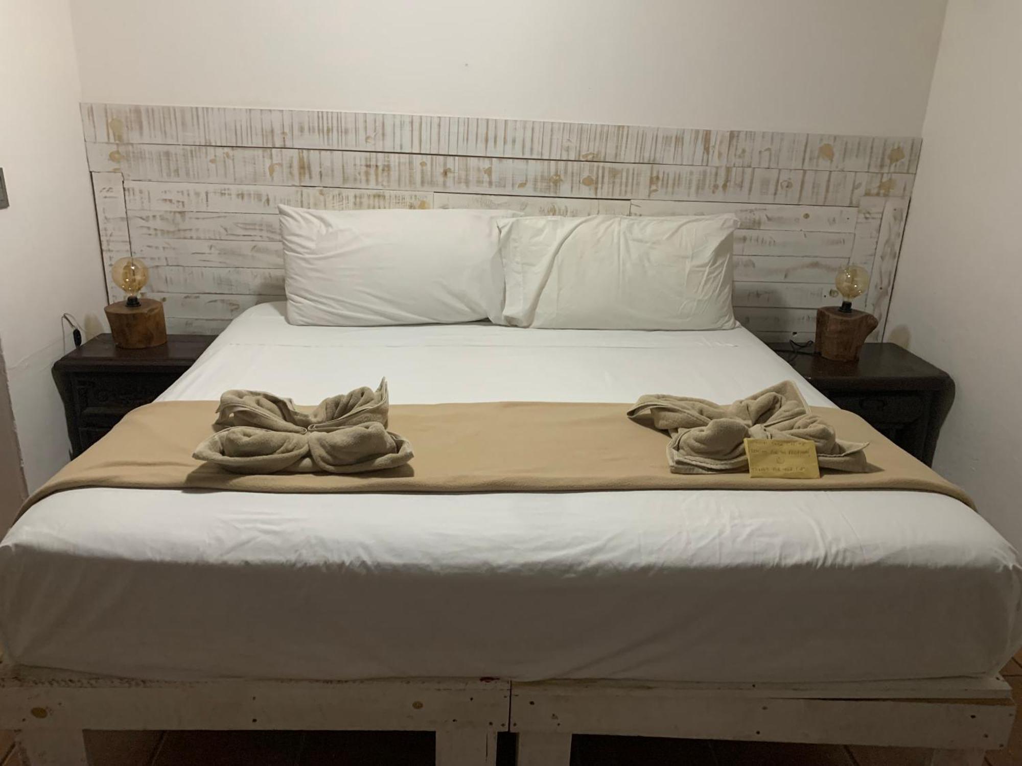 Casa Caribe 칸쿤 외부 사진 A bed