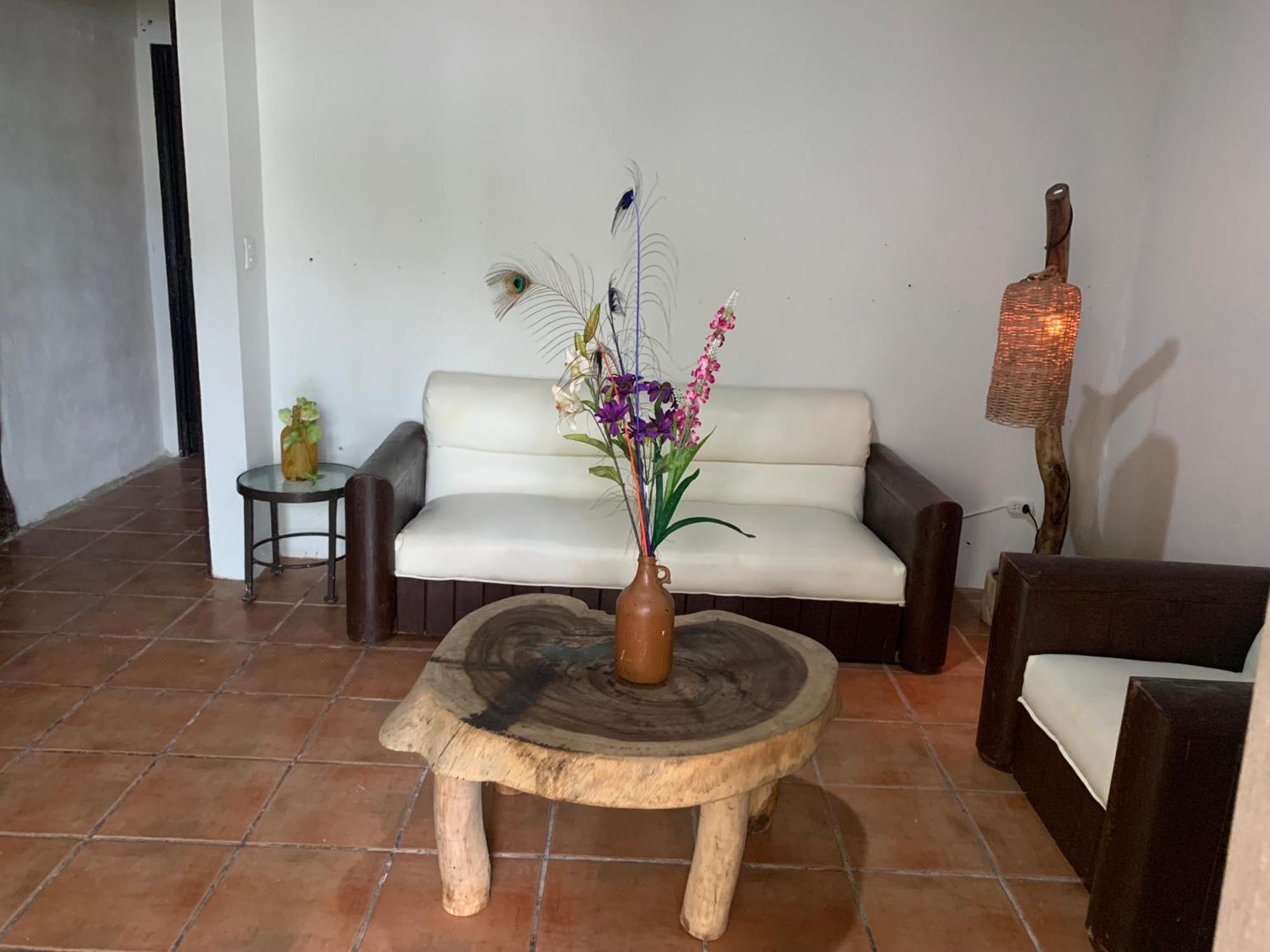 Casa Caribe 칸쿤 외부 사진 A living room in a typical house in the community